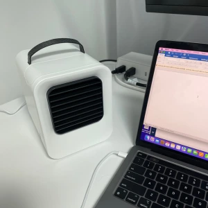 Image of Chiller Portable AC on a desc next to a laptop